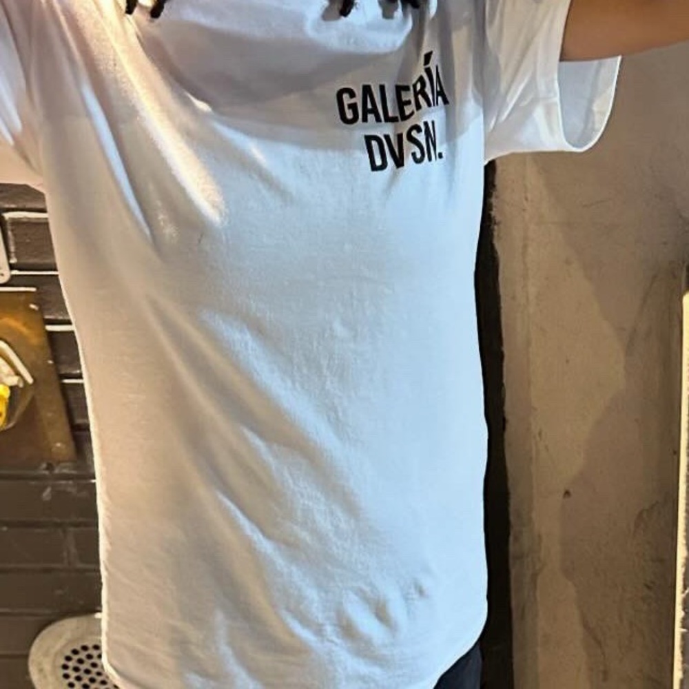 White gallery dvsn shirt with black letters